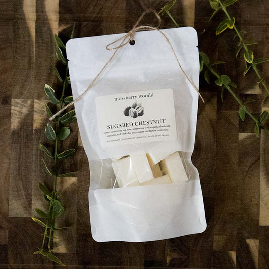 Sugared Chestnut soy wax melts with jute twine bow on a wooden table