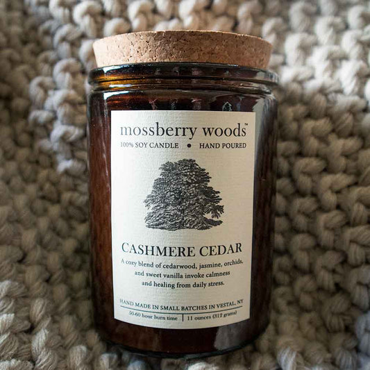 Cashmere Cedar Rustic candle in an amber jar with a cork lid top view