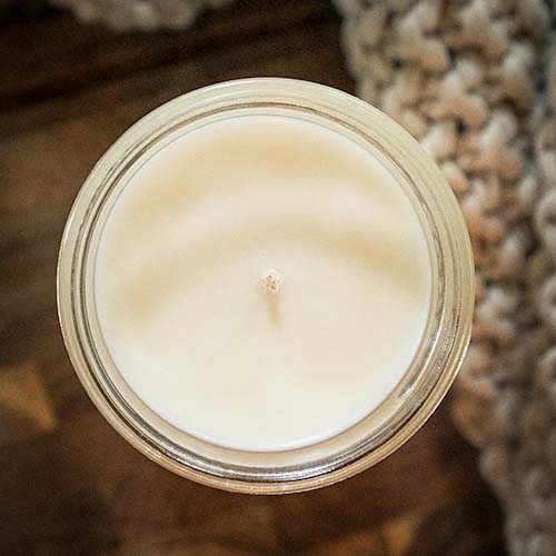 Top view of our country cottage candle showing its smooth, creamy soy wax and centered wick
