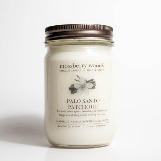 Palo Santo candle in a mason jar with a rustic lid