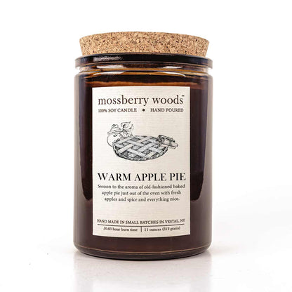 Rustic amber candle with cork lid and an apple pie on the label