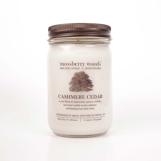 Cashmere Cedar Country Cottage candle in a mason jar with a brown rustic brown lid on a white background