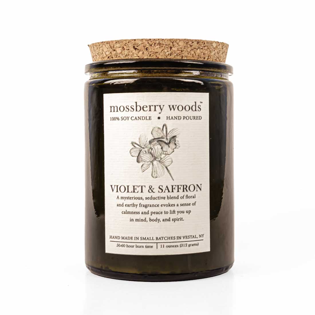 Violet & Saffron soy candle in green rustic jar with a cork lid on a white background