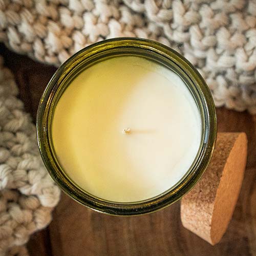 Top view of an Autumn Birch candle in a vintage green container