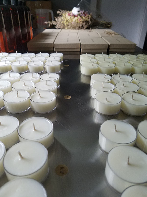 Image of tealights being put together