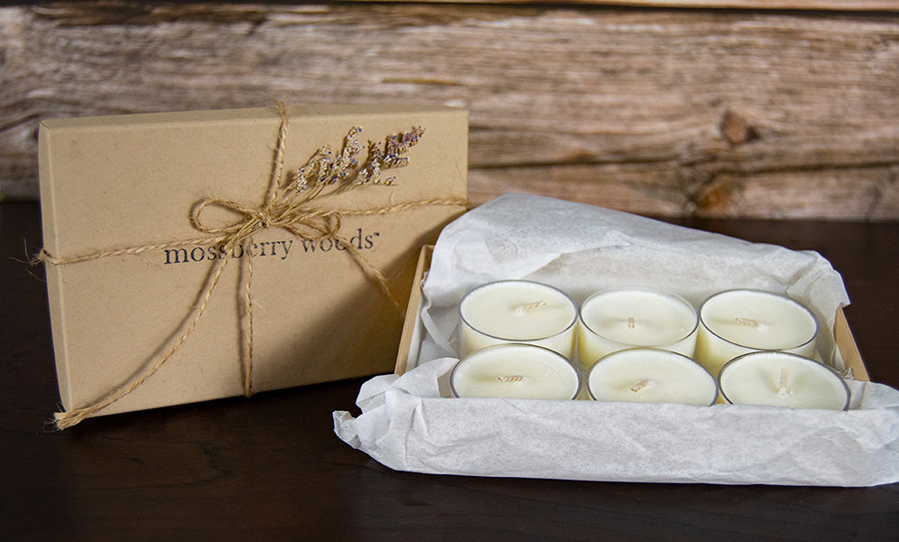 Image of a box of tealights in a kraft gift box wrapped with jute twine